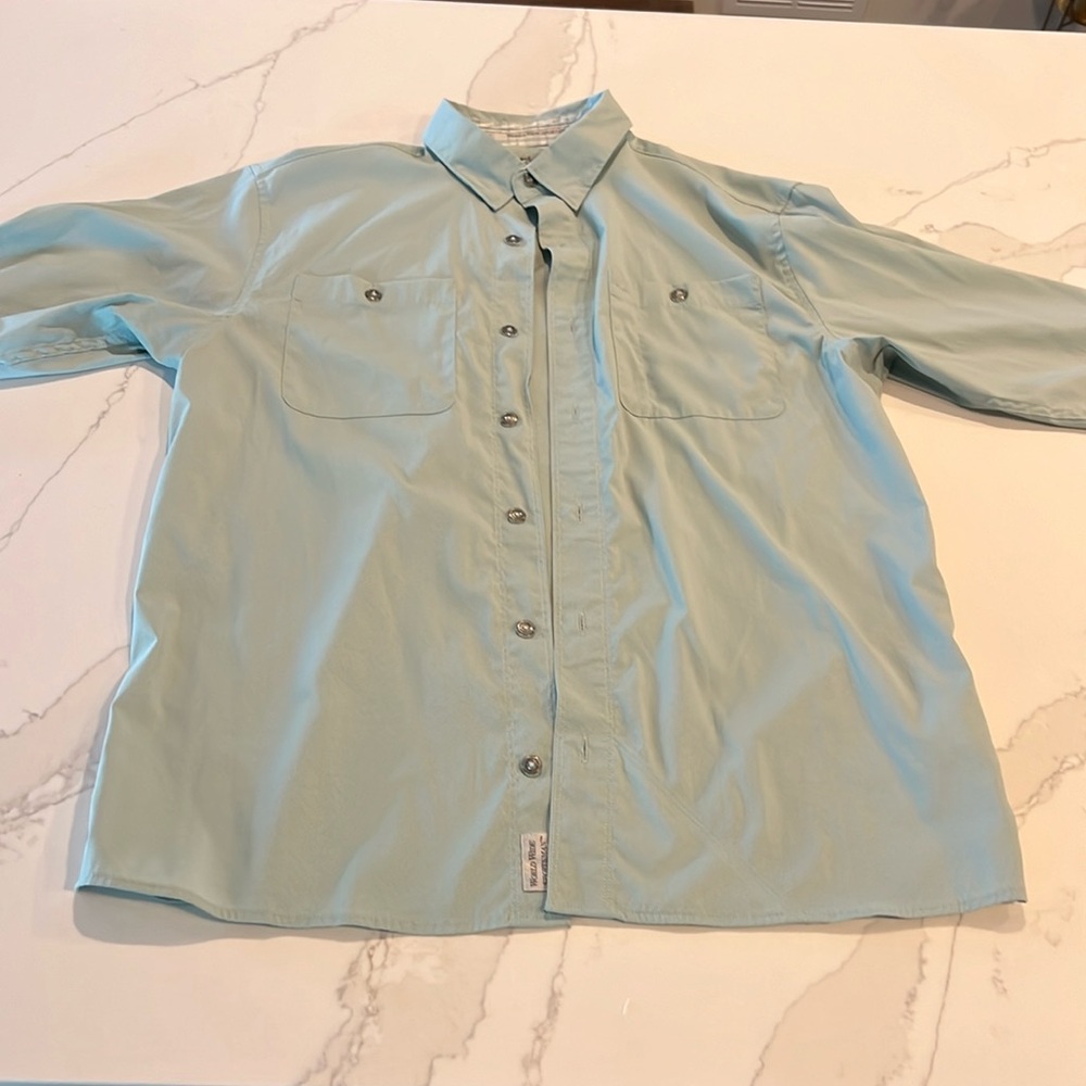 World Wide Sportsman light sea green men’s fishing shirt.